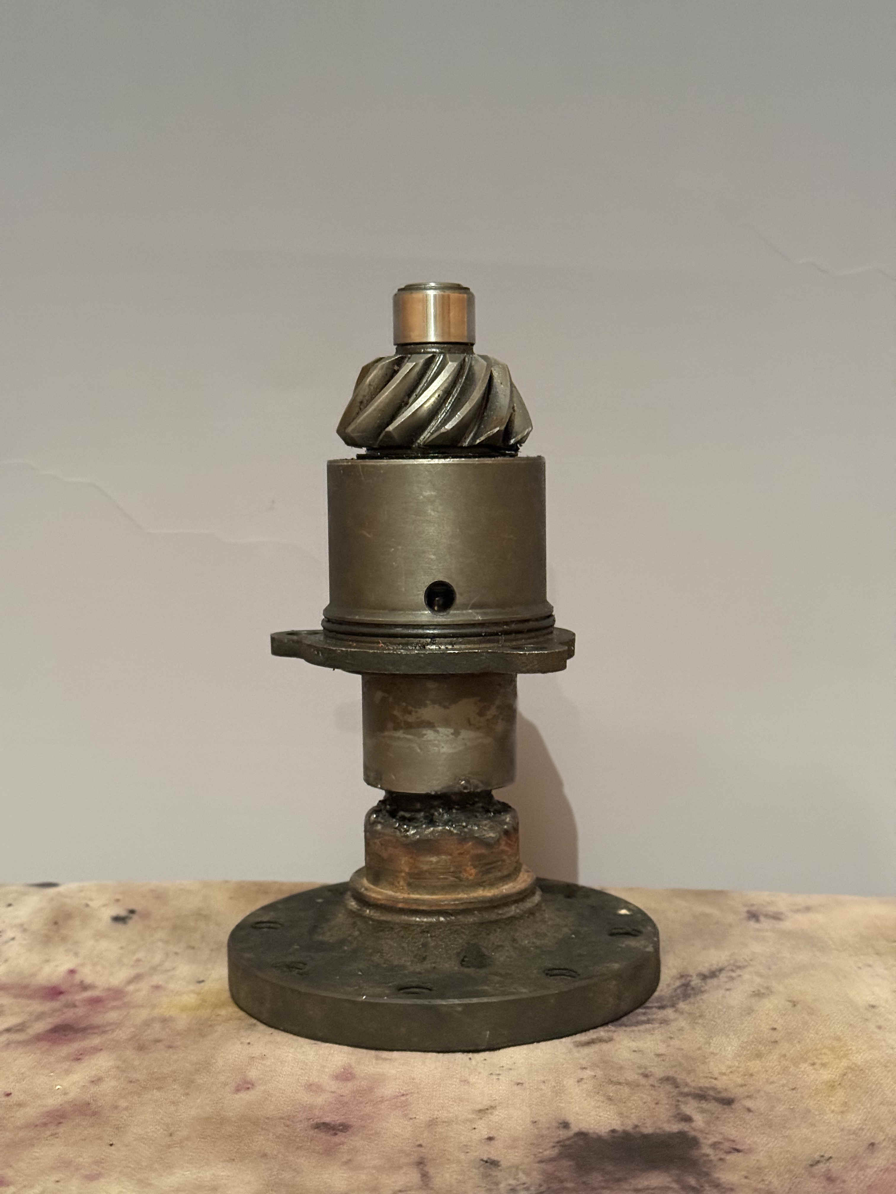 a trophy made of repurposed engine parts