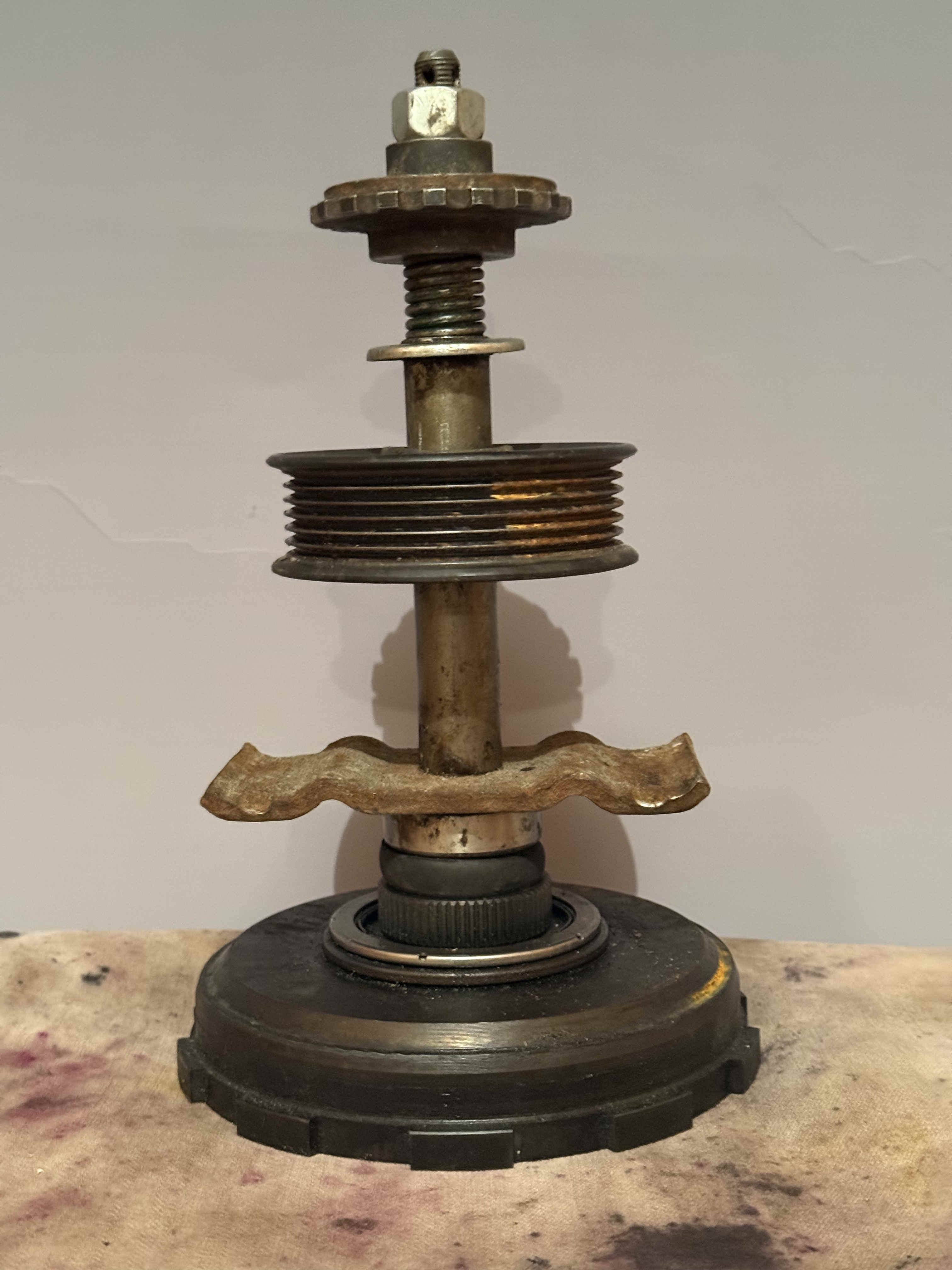 a trophy made of repurposed engine parts
