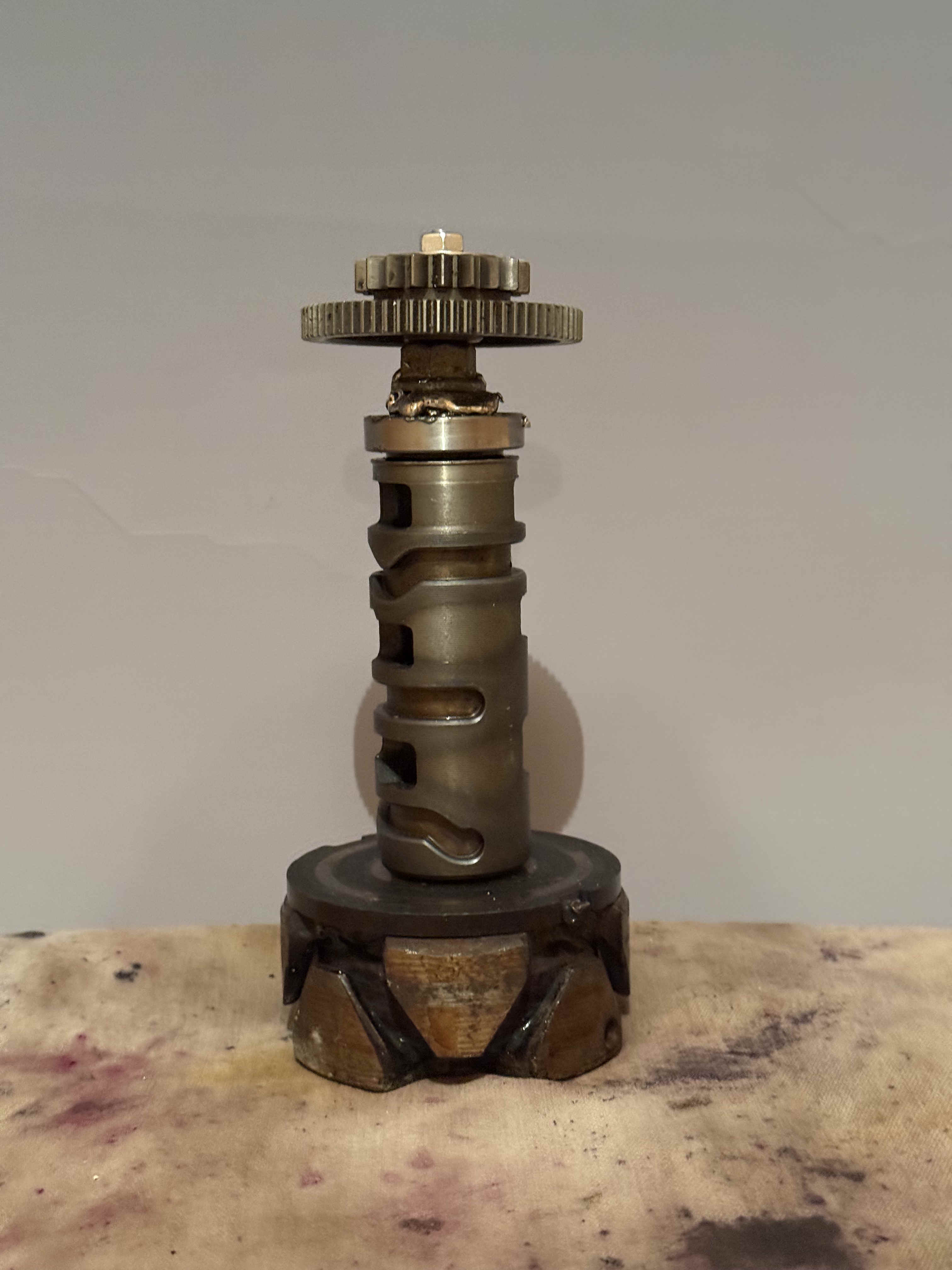 a trophy made of repurposed engine parts